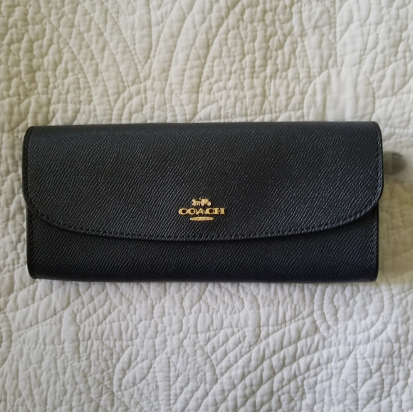 Coach Handbags - NWT COACH Slim Flap Wallet